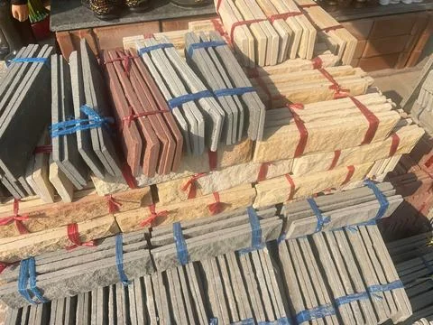 Bundles of Natural Stone Cladding Tiles for Wall Decoration and Landscaping Stock Photos