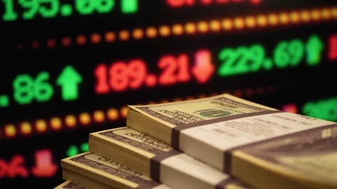 Bundles of US dollars against the background of an online trading platform. Stock Footage 290070086