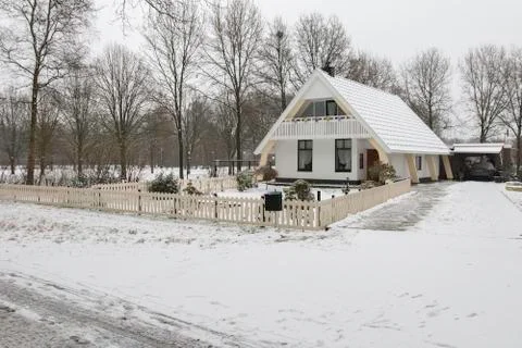 A Bungalow House in Snow Stock Photos