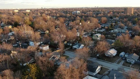 Bungalow rooftops and winter tree canopy across Tulsa Stock-Footage 121108763