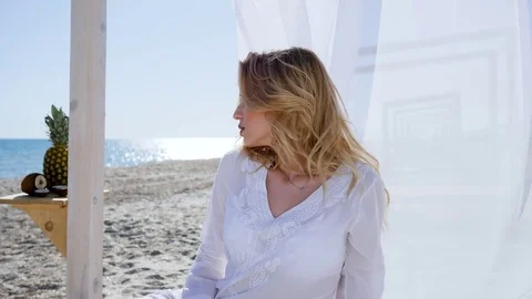 Bungalow, wind develops cloth, portrait beautiful lady, Embankment, 動画素材 76975821