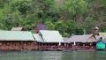 Bungalows on the Kwai river in northwestern Thailand HD Footage