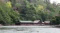 Bungalows on the Kwai river in northwestern Thailand HD Footage