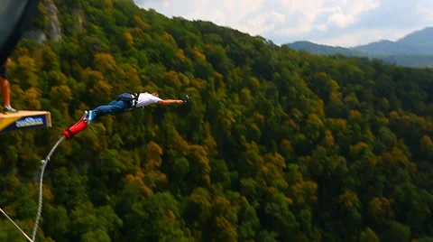 Bungee jump, men from the bridge with 207m Stock Footage 44763675