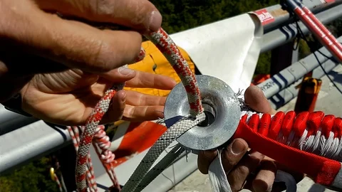 Bungee rope tie hands Stock Footage 95208839