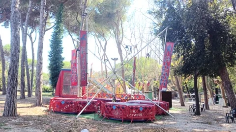 Bungee trampoline in pine forest in Viareggio, Italy, August 15, 2026 Stock Footage 342338865