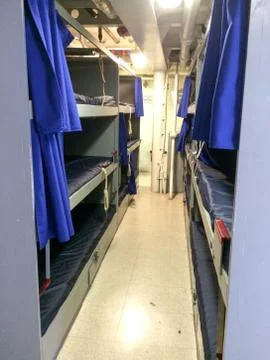 Bunk beds on board navy naval ship for war Stock Photos