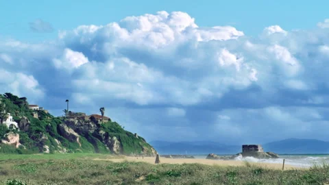 Bunker on the beach and huge clouds full color. Zahara de los Atunes Stockbeeldmateriaal 304461500