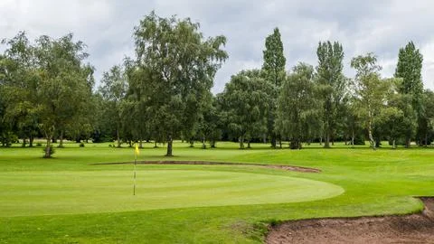 Bunkers surrounding the green Stock Photos