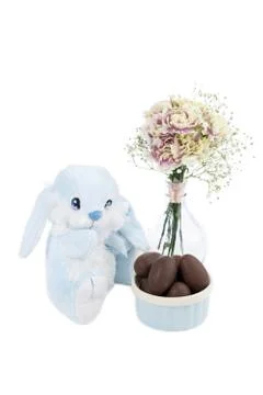 Bunny with flower and easter eggs Foto stock