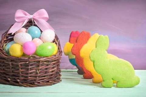 Bunny shaped cookies and Easter eggs Stock Photos