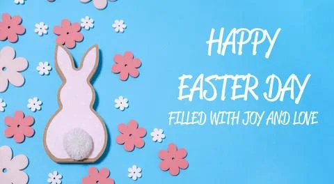 Bunny is surrounded by flowers Stock Photos