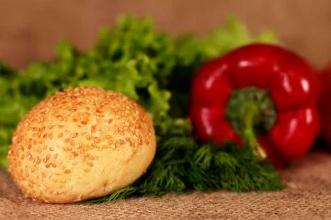Buns and vegetables Stock Photos