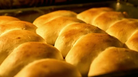 Buns baking in oven. Buns with cherry baking. Bakery concept. Hot oven buns. Stock Footage 255485346
