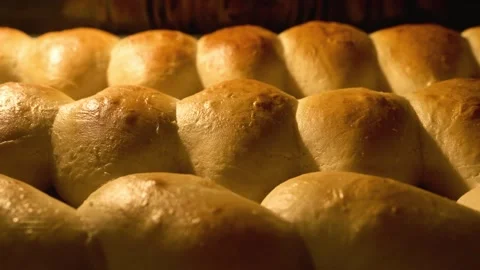 Buns baking in oven. Buns with cherry baking. Bakery concept. Hot oven buns. Stock Footage 290086315