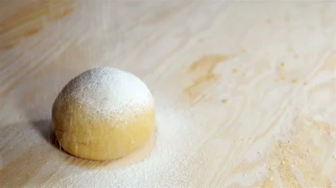 Buns sprinkled with icing. Slow motion. Stock Footage 57556113