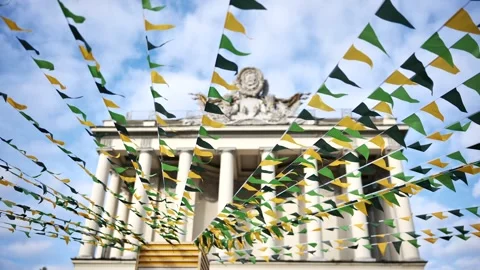 Bunting flags decorating building facade celebrating festival 스톡 동영상 318805592