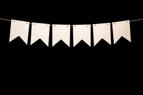 Bunting, six white shapes on string for banner message Stock Photos