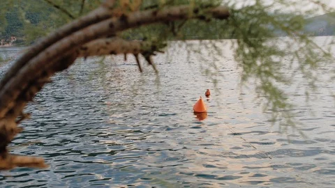 Buoy sways in the waves Camera zoom Stock Footage 117073480