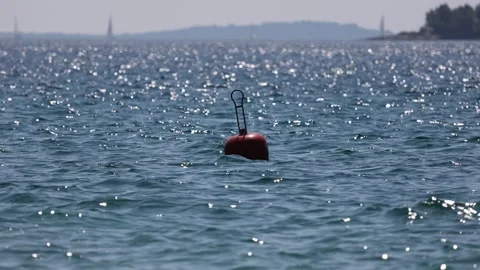 Buoy sways on the waves of the sea Stock Footage 161830105