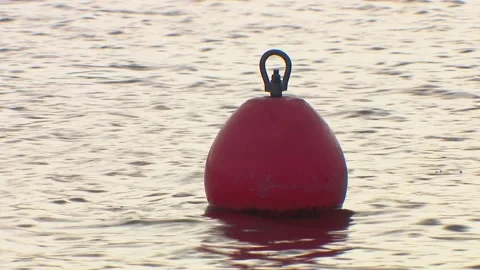 Buoy on the water. Bathing is prohibited, do not swim behind the buoy. Stock-Footage 148525297