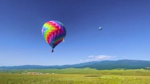 Buoyancy in Motion: Rainbow Balloon 動画素材 339270473