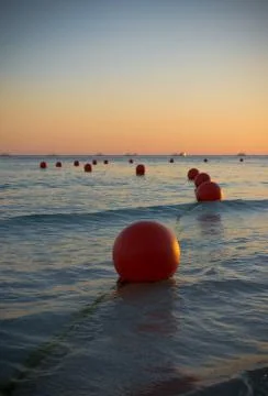 Buoys at sunset Stock Photos
