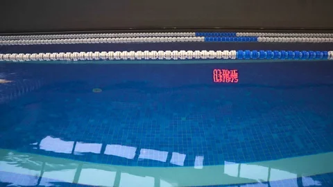 Burak 23 swimmer is exercising at the pool Stock Footage 99829198