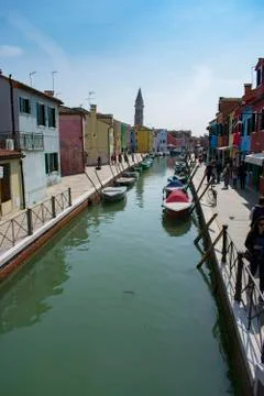 Burano / Venice / Italy - April 17, 2019: Burano island canal, colorful house Stock Photos