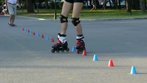 BURGAS, BULGARIA - AUGUST 8, 2016: Young girl roller skating in the park. Stockbeeldmateriaal 152777046