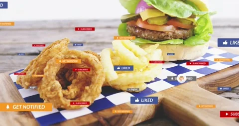 Burger and fries on board, cursor moving social badges flooding over food then Stock Footage 331429374