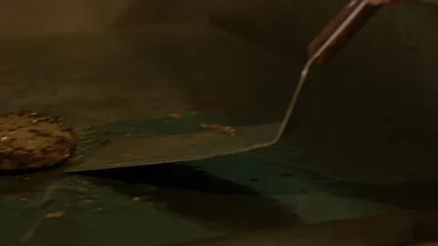 Burger being flipped Stock Footage 127961358