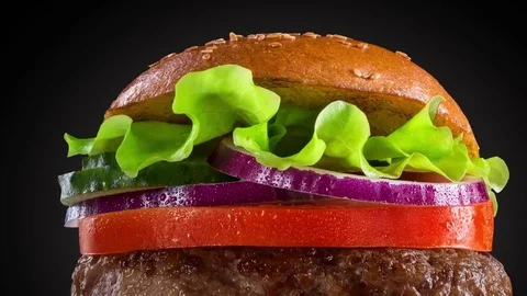 Burger on black background close up Stock Footage 72671817