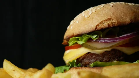 Burger on black background Stock Footage 241821816