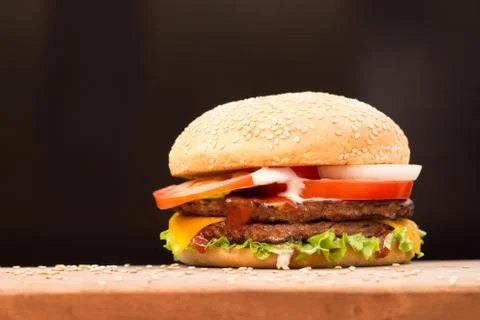 Burger with black background Stock Photos