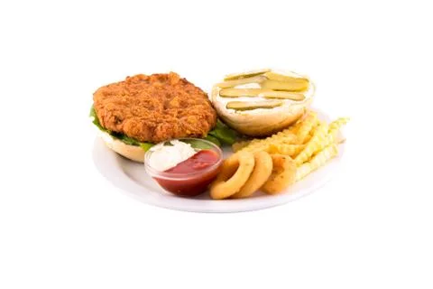 Burger with breaded cutlet with sour cream and pickles Stock Photos