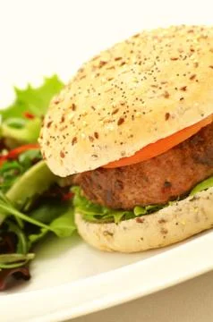 Burger in bun Stock Photos