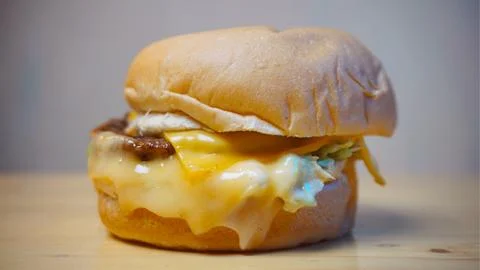 A burger with a bun Stock Photos