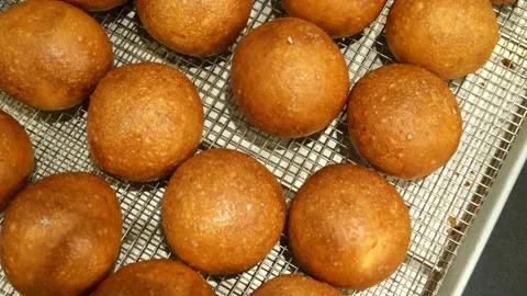 Burger buns are being prepared by bakers Stock Footage 201894543