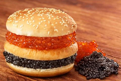 Burger with caviar Stock Photos