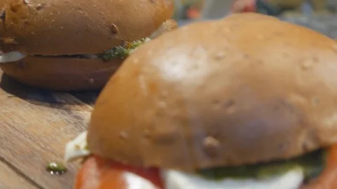 Burger with cheese and vegetables. Stock Footage 81082726