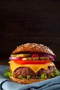 Burger with cheese close up. Stock Photos