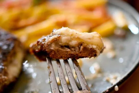 Burger with cheese inside close up image. Stock Photos