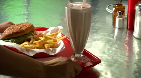 Burger with chips and chocolate shake Stock Footage 8572971