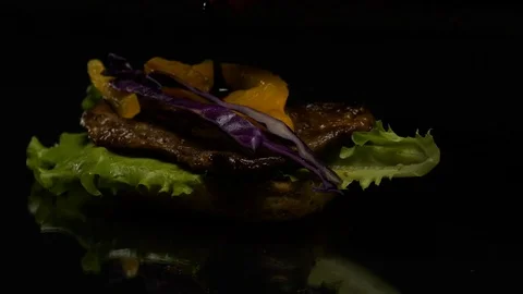 The Burger is cooked on the table Stock Footage 80608691