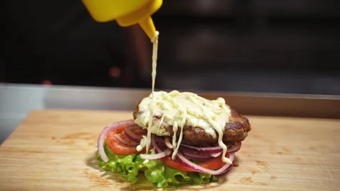 Burger cooking Stock Footage 129685112