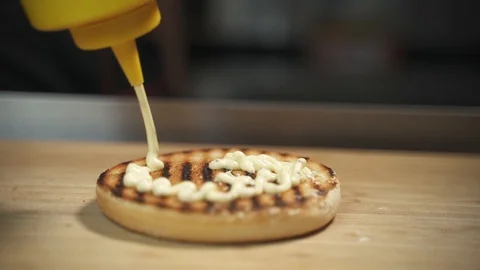 Burger cooking Stock Footage 129685481