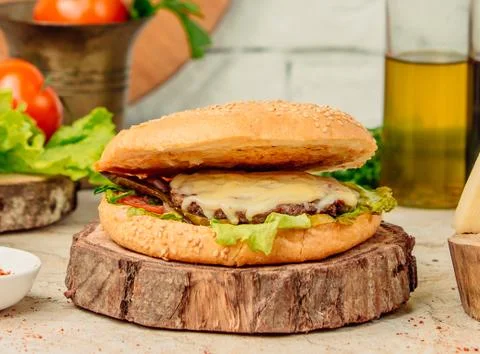 Burger with cotlet, cabbage and tomato Stock Photos