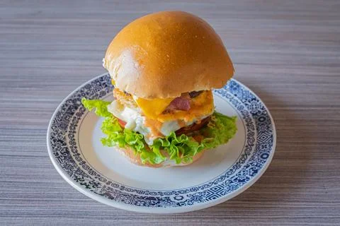 Burger with egg cheese and crispy bacon 스톡 사진