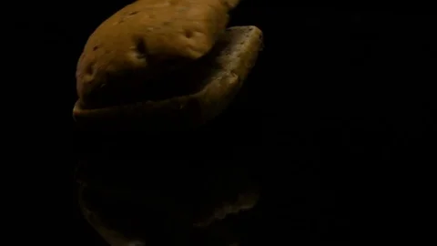 The Burger falls in slow action on the table Stock Footage 80427035